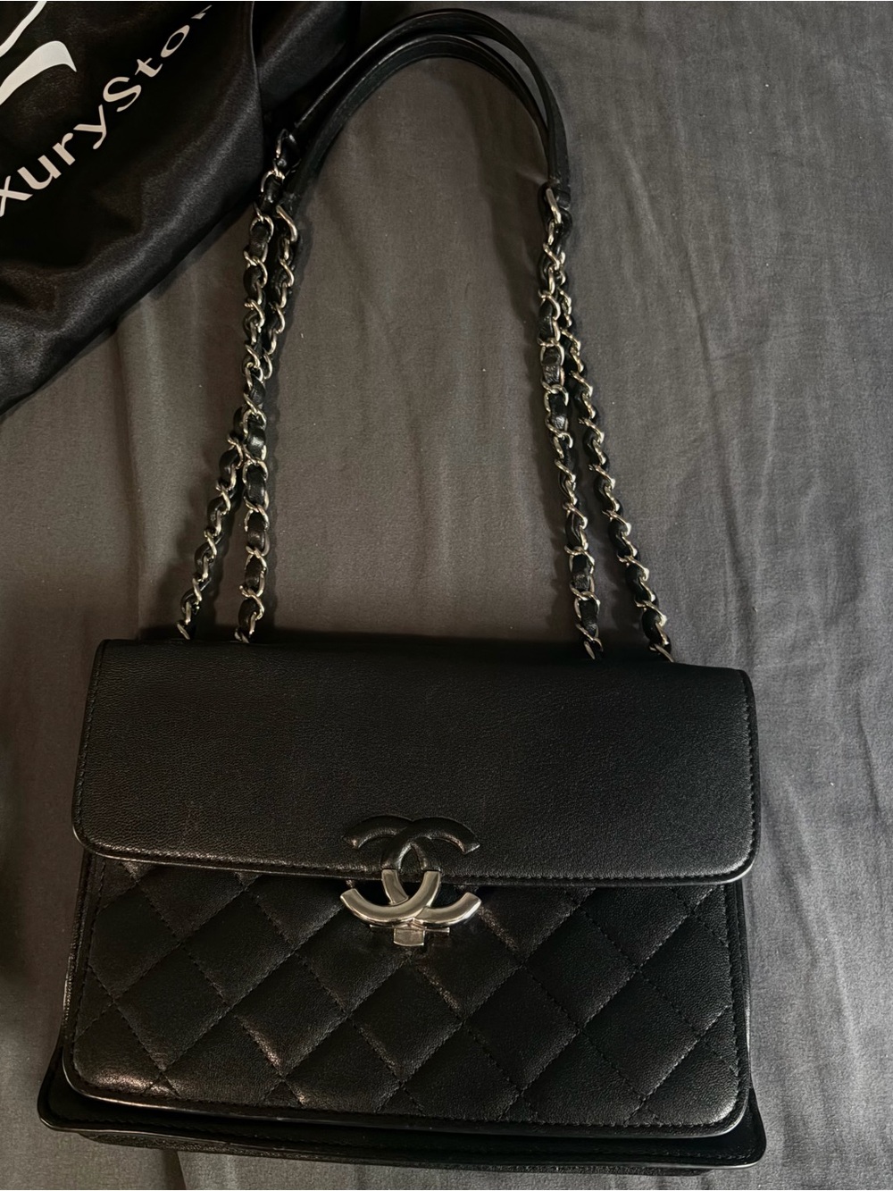 CHANEL Black Quilted Leather Shoulder Bag with Silver-Tone CC
